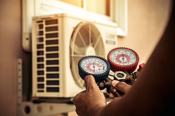 Professional Air Conditioning Service technician working in Galesville, WI
